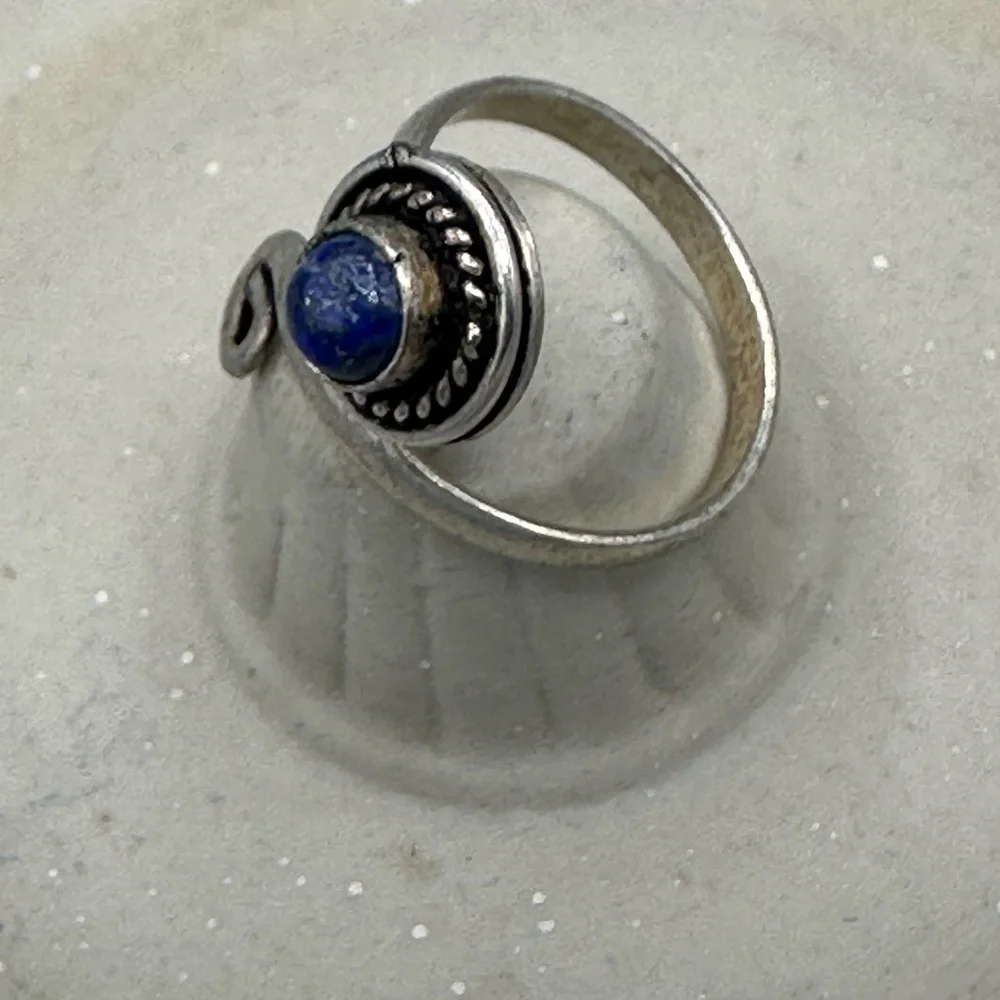 Artisan Silver Ring with Deep Blue Stone